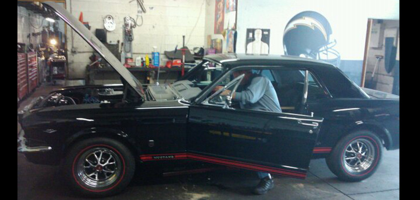 Red 1965 Ford Mustang classic car